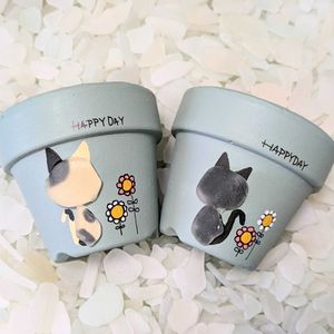 アガベ,猫ちゃんの後ろ姿,寄せ植え,多肉植物,リメ缶の画像