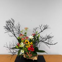 カーネーション,ヒマワリ,ユリ,グロリオサ,ハランの画像