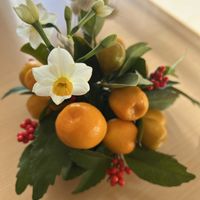 キンカン,スイセン,センリョウ,バニーテール,アレンジの画像