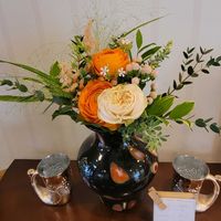 カーネーション,バラ,ヒペリカム,ラナンキュラス,ユーカリの画像