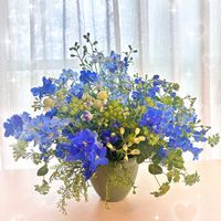グリーンベル,ブプレリウム,デルフィ二ウム,フラワーアレンジメント,青い花の画像
